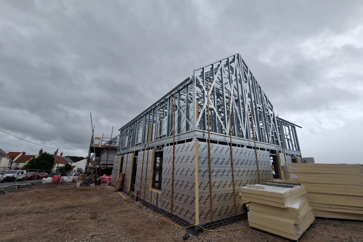 Steel framing installation progress photo from a housing plot in Cornwall